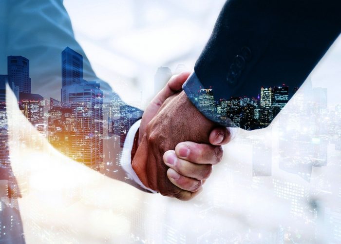 handshake, business deal, city-6701408.jpg